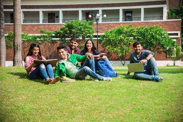 Wall Mural - Asian Indian college students doing group study or working on project