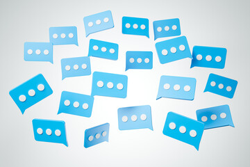 Flying blue message cloud boxes with dots over white background. Internet communication and social network concept.