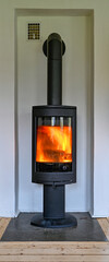 cast iron stove standing tall in livingroom