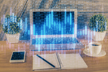 Double exposure of forex graph and work space with computer. Concept of international online trading.