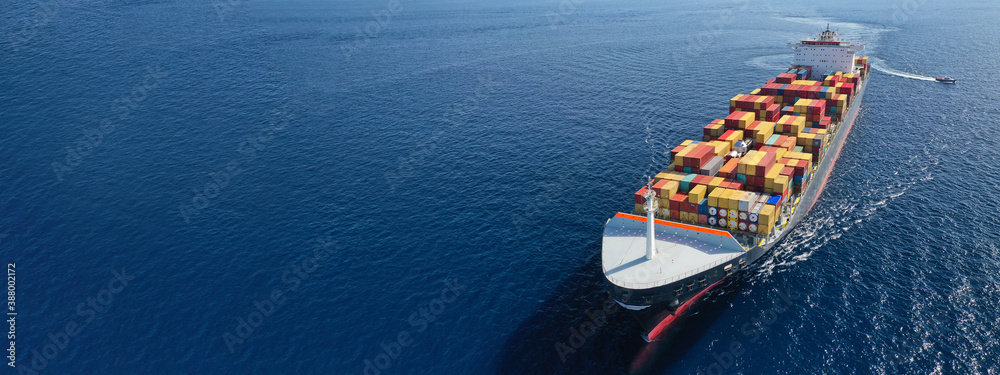 Aerial drone panoramic ultra wide photo of industrial truck size container tanker ship cruising in open ocean deep blue sea - obrazy, fototapety, plakaty 