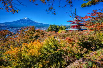 Wall Mural - The Chureito Pagoda and Arakura Sengen Shrine, a Shinto shrine in Yamanashi Prefecture, Japan, close to Mount Fuji, seen here in autumn.