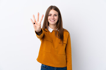 Wall Mural - Young woman over isolated white background happy and counting four with fingers