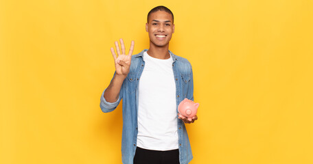 Sticker - young black man smiling and looking friendly, showing number four or fourth with hand forward, counting down