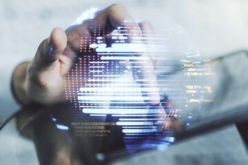 Poster - Multi exposure of abstract programming language hologram with world map and hand working with a digital tablet on background, artificial intelligence and neural networks concept