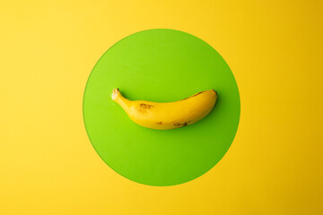 Poster - banana in yellow and green background