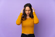 © luismolinero - Young mixed race woman isolated on purple background with headache