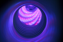 Abstract Swirl Tunnel With Violet Light On A Background Pattern Textured For Design.