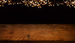 Celebration background with bokeh
Celebration background with festive golden bokeh lights and rustic wooden table. Chistmas and new year concepts. Space for text and design.