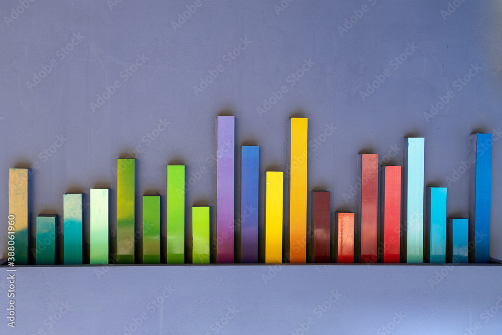 Colorful chart lines in real world made of rainbow colored plastic ...