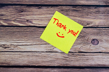 Wall Mural - Thank you note on paper note wood background