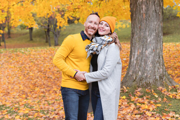 a nice couple in the autumn park