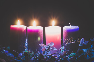 advent decoration with three burning candles