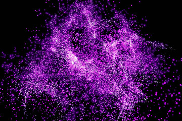 Wall Mural - neon pink exploding defocused particles on a black background 3d render