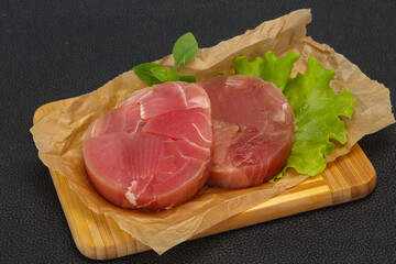 Raw tuna round steak for grill