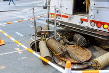 Open Manhole With Few Cables Connection Internet Using Fiber Optic Cable For Fast Internet Underground Street City