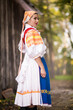 © muro - Slovak folklore. Girl in slovak folk dress.