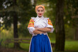 © muro - Slovak folklore. Girl in slovak folk dress.