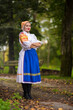 © muro - Slovak folklore. Girl in slovak folk dress.