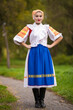 © muro - Slovak folklore. Girl in slovak folk dress.