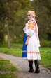 © muro - Slovak folklore. Girl in slovak folk dress.