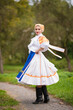 © muro - Slovak folklore. Girl in slovak folk dress.