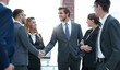 © ASDF - business handshake of businessmen in the office