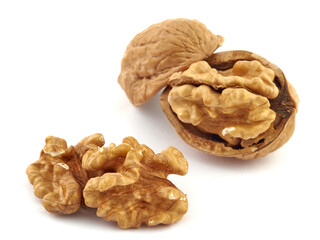 Wall Mural - Walnuts and shells lie on a white background.Isolate