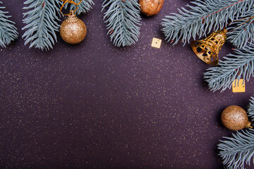 Wall Mural - winter holiday decoration card festive concept: christmas trees, bells and balls on black background