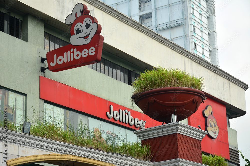 Jollibee Fast Food Restaurant Facade In Manila Philippines Stock Photo jollibee-fast-food-restaurant-facade-in-manila-philippines-stock-photo