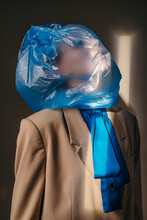 Stylish Woman Suffocating Under Plastic Bag