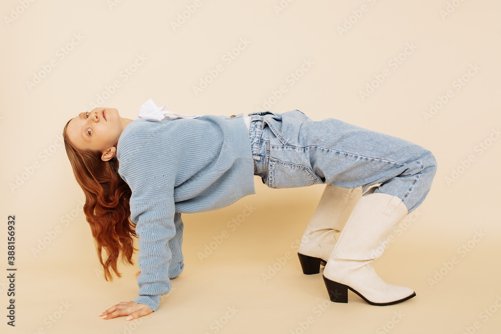 Fashionable ginger model in spring outfit Stock Photo | Adobe Stock