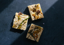 Sliced Pieces Of Focaccia With Flower Toppings And Sea Salt