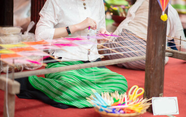 Northern thailand woman weaving machine hand made