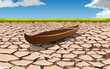 wooden boat in the dry river in the winter