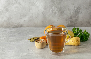 Homemade beef bone broth in a glass