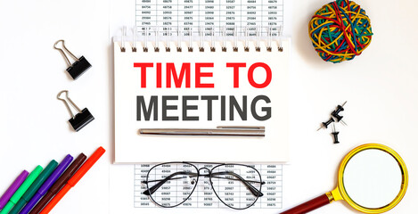 Poster - Notepad with the text TIME TO MEETING on a light background, near glasses and office tools