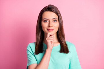 Sticker - Photo portrait of thoughtful curious girl smiling touching chin with hand isolated on pastel pink color background