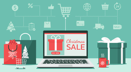 Wall Mural - Christmas online shopping or winter holiday sale concept on laptop screen with gift boxes, shopping bags, the shopping cart on the desk, and icon, vector flat illustration