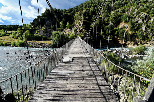 Cuadros en Lienzo wooden bridge in forest, photo as a background , in janovas fiscal sobrarbe , hu