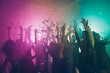 © deagreez - Photo of big group many fancy ladies dance raise hands falling confetti neon vibrant spotlight modern club indoors