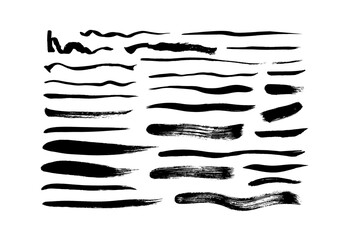 Vector grungy paint brush strokes collection. Calligraphy straight smears, stamp, lines. Hand drawn ink illustration isolated on white background. Vector black paint, ink brush stroke, line or texture