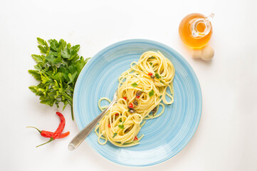 linguine made with garlic, oregano, capers, olives, lemon peel, mackerel and a drop of aromatic oil with anchovies (colatura di alici in italian)