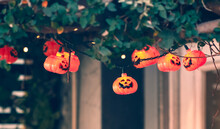 Halloween Lights In The Shape Of Jack-o-lanterns, With Focus On The Light In The Middle