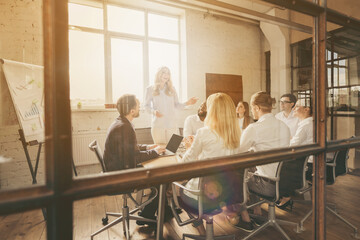 Sticker - Photo of business people diversity different ages colleagues listen anti crisis crash project discuss layoff staff dismissal question budget fail closing production spacious office indoors