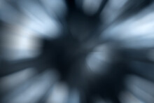 Blurred Lights Dark Gray Blue Background. Abstract Soft Explosion Effect. Centric Motion Pattern