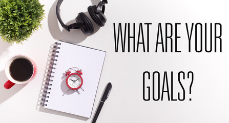 Sticker - What Are Your Goals Question Over White Office Desk Background