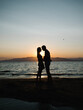 © Aran Martinez - Couple silhouette sunset beach engagement