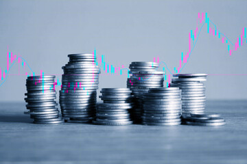 graph coins stock finance and business concept