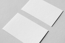 Textured Business Card Mockup On A Grey Background.  85x55 Mm.